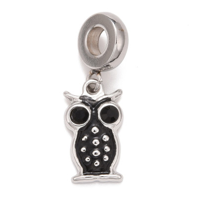Eyelet with pendant in the shape of an owl, surgical steel
