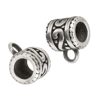 A bead with an eyelet decorated with a surgical steel spiral