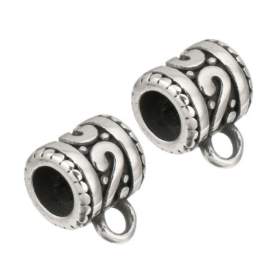 A bead with an eyelet decorated with a surgical steel spiral