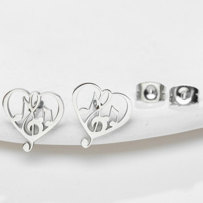 Puset hearts with treble clef surgical steel