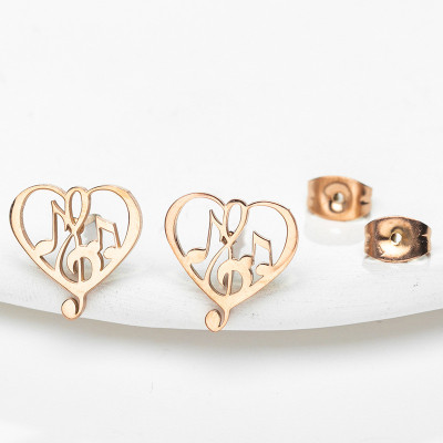 Puset hearts with treble clef surgical steel