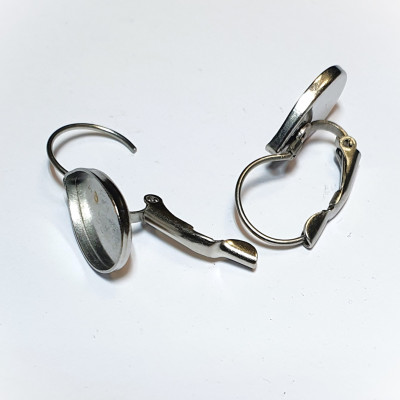 Mechanical earrings with a drop-shaped cup made of surgical steel
