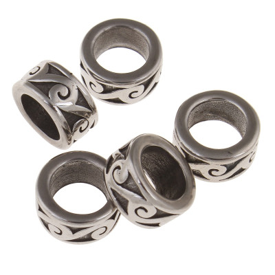 Bead with surgical steel ornament