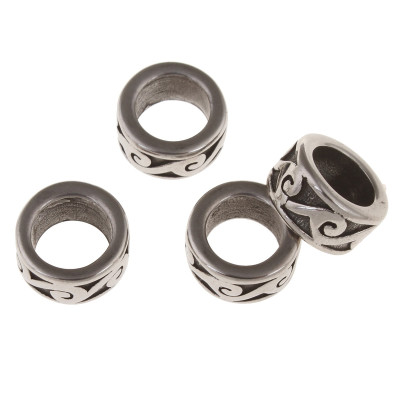 Bead with surgical steel ornament