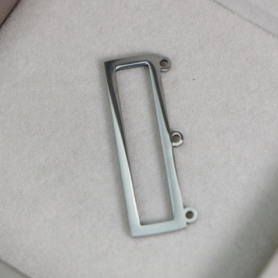 Connector rectangle with three eyelets, surgical steel
