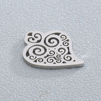Heart pendant with surgical steel ornament