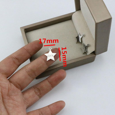 Pendant star with the inscription Luck surgical steel