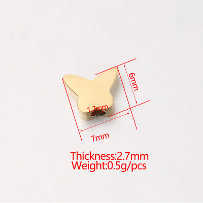 Bead with small bow tie in two colors of surgical steel