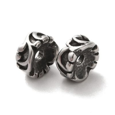 Ring with surgical steel ornament