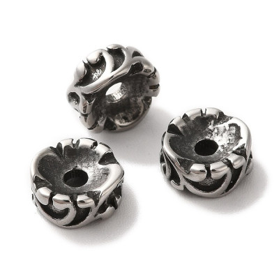 Ring with surgical steel ornament