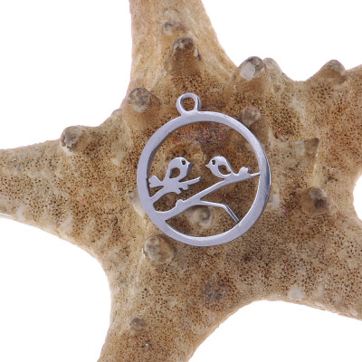 Pendant wheel with birds surgical steel