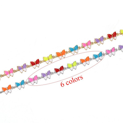 Chain in gold galvanization with colorful surgical steel bow ties