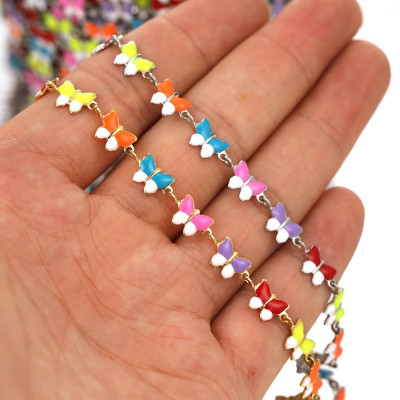 Chain in gold galvanization with colorful surgical steel bow ties