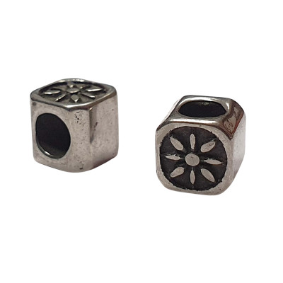 Bone bead with a flower, surgical steel