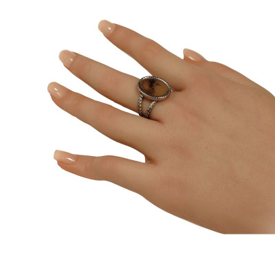 Adjustable ring with a round bowl for sticking a cabochon, surgical steel