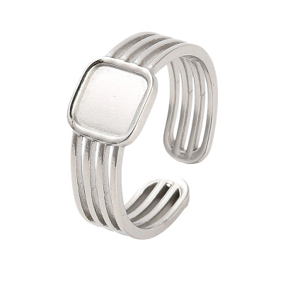 Adjustable ring with a round bowl for sticking a cabochon, surgical steel