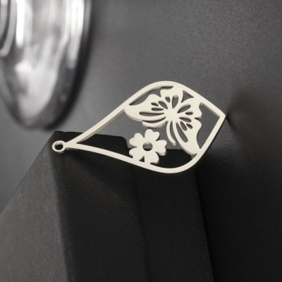 Pendant drop with butterfly and flower surgical steel two colour variants