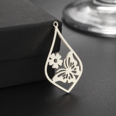 Pendant drop with butterfly and flower surgical steel two colour variants