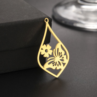 Pendant drop with butterfly and flower surgical steel two colour variants