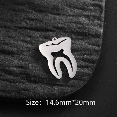 Přívěsek zoubek chirurgická ocel dvě barevné varianty