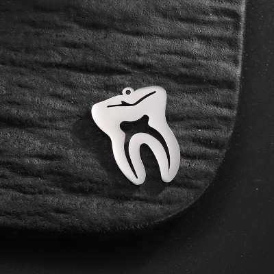 Pendant tooth surgical steel two colour variants