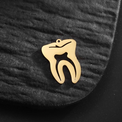 Pendant tooth surgical steel two colour variants