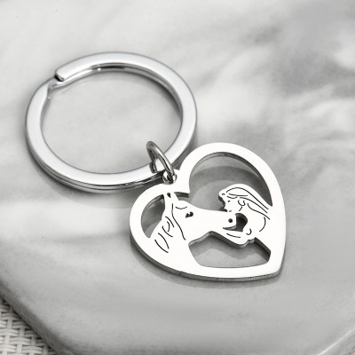 Surgical steel owl pendant