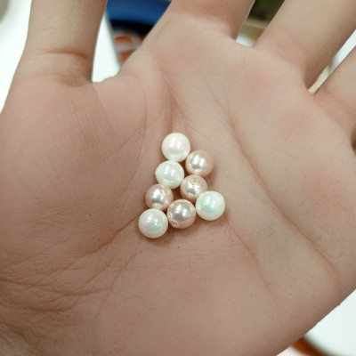 Laboratory pearls white or pink 6,30mm
