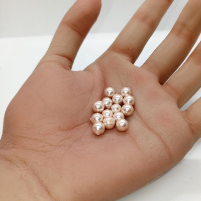 Laboratory pearls white or pink 6,30mm