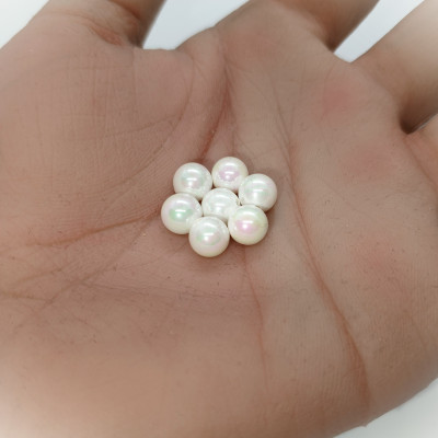 Laboratory pearls white or pink 6,30mm