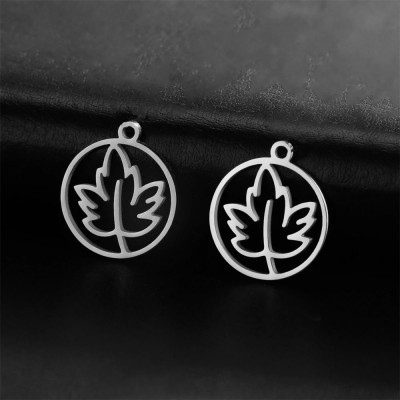 Cloverleaf pendant in two color combinations of surgical steel