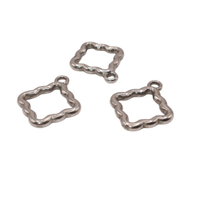 Cloverleaf pendant in two color combinations of surgical steel