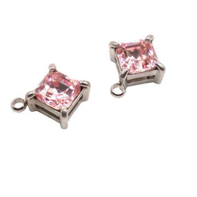 Cloverleaf pendant in two color combinations of surgical steel