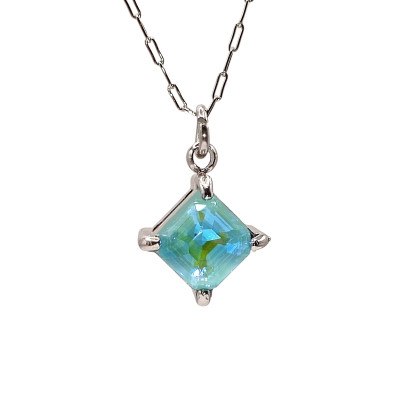 Cloverleaf pendant in two color combinations of surgical steel