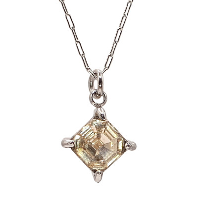 Cloverleaf pendant in two color combinations of surgical steel