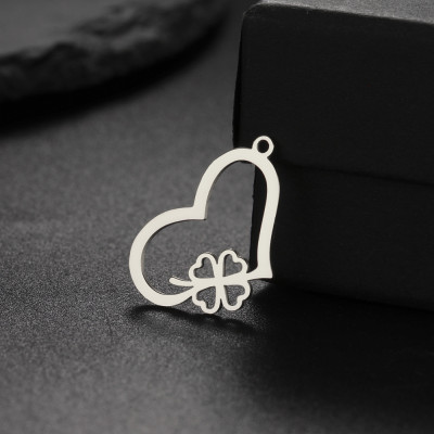 Cloverleaf pendant in two color combinations of surgical steel