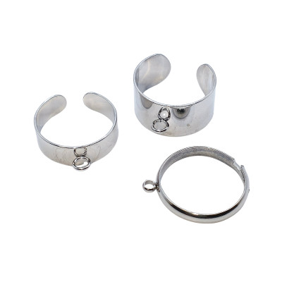 Adjustable ring with a round bowl for sticking a cabochon, surgical steel