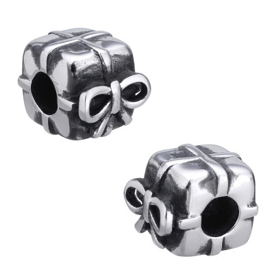 Bead with a large bow wrapped gift of surgical steel