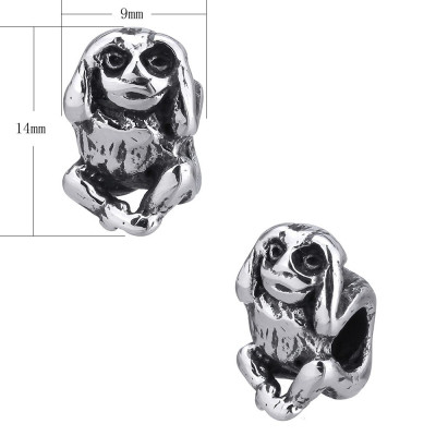 Little bead monkey covering his surgical steel ears