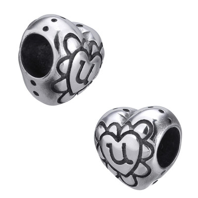 Heart-shaped bead with surgical steel ornaments