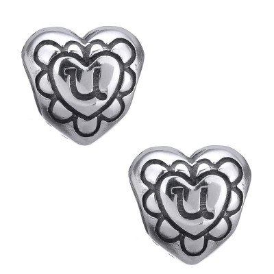 Heart-shaped bead with surgical steel ornaments