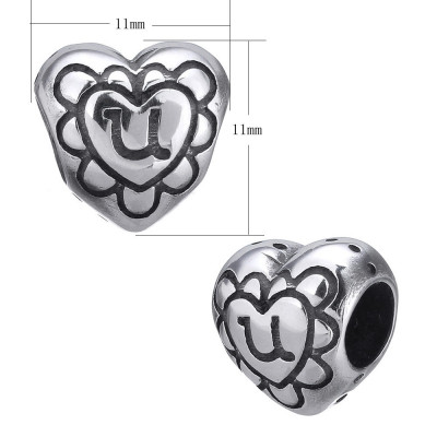 Heart-shaped bead with surgical steel ornaments