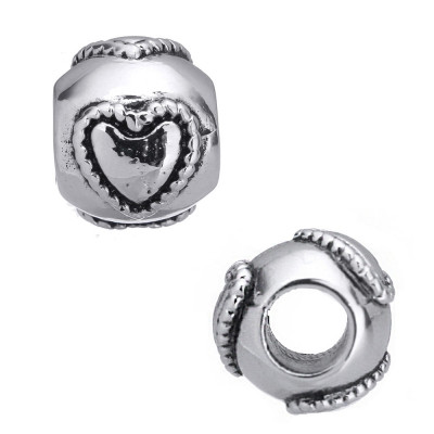 Bead with raised hearts in two color variants of surgical steel