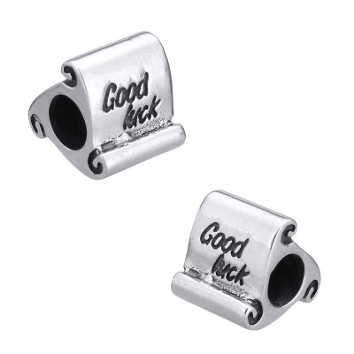 Bead with inscription Good Luck of surgical steel