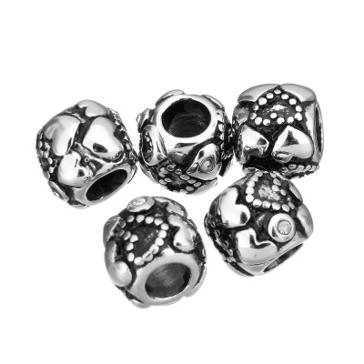 Surgical steel bead with hearts