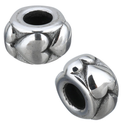 Surgical steel bead with embossed hearts