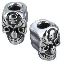 Bead decorated with surgical steel skull
