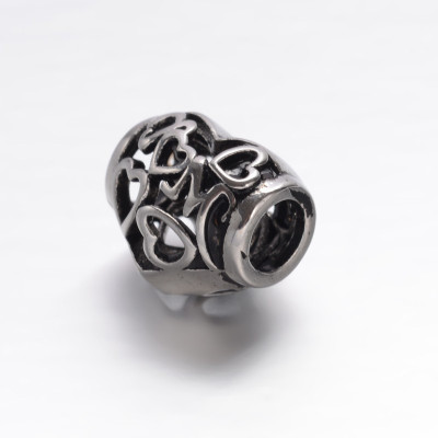 Surgical steel filigree heart bead